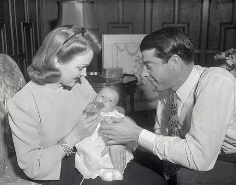 mr and mrs joe dimaggio with their infant son