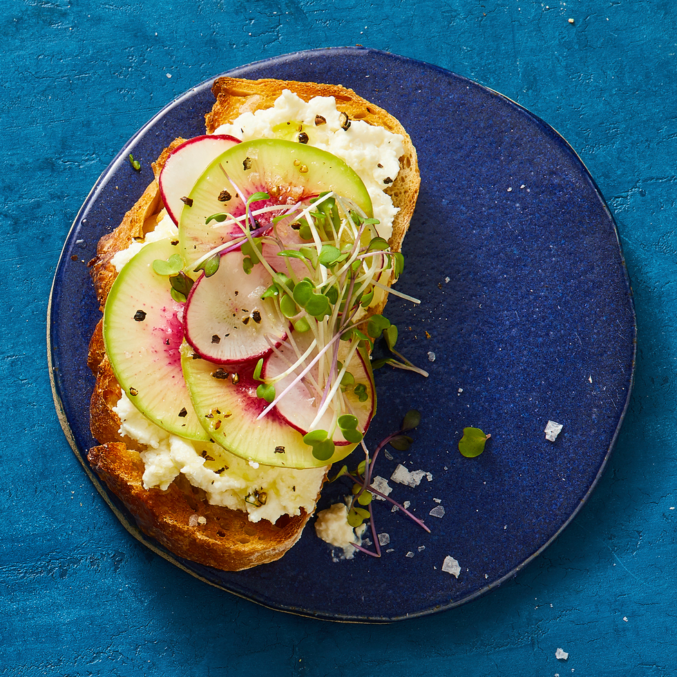Whipped Feta and Watermelon Radishes Toast whipped feta and watermelon radishes toast on a plate