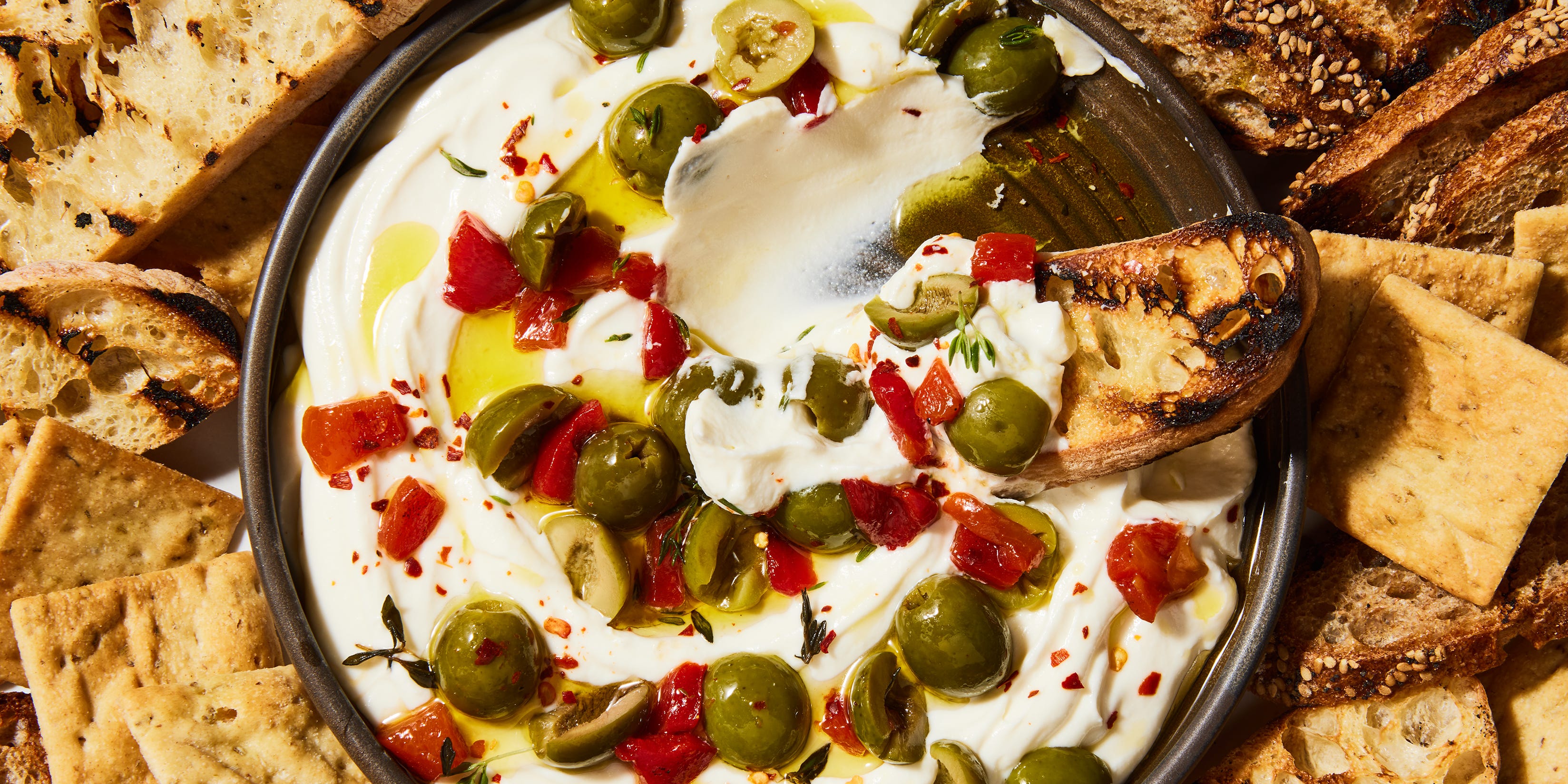 Whipped Ricotta With Olives & Roasted Red Peppers Is The Appetizer Of The Season