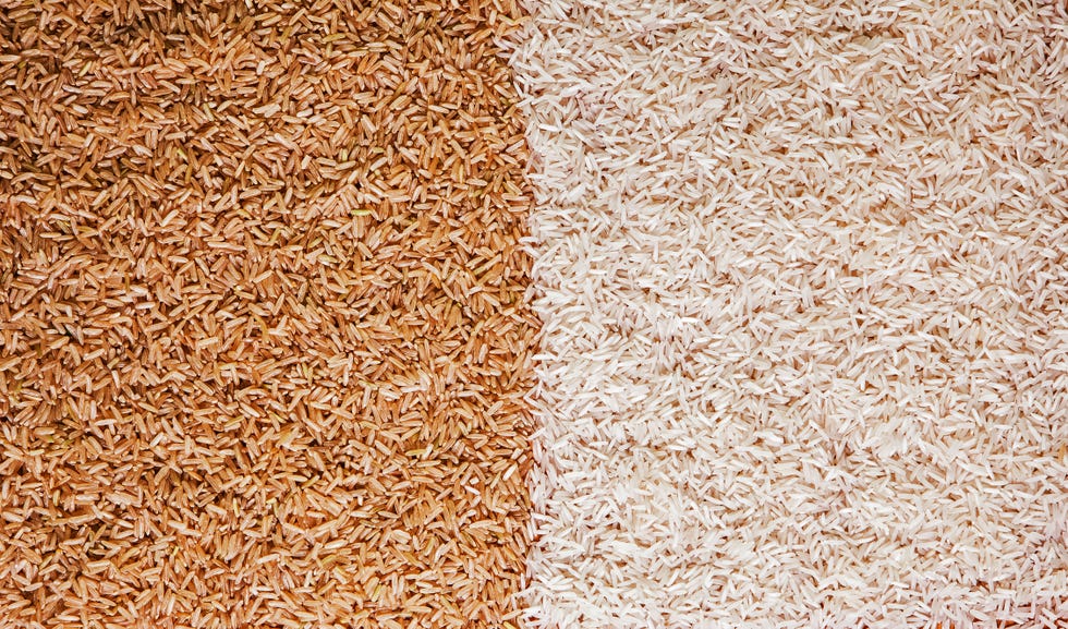 white and brown rice grains contrast background texture
