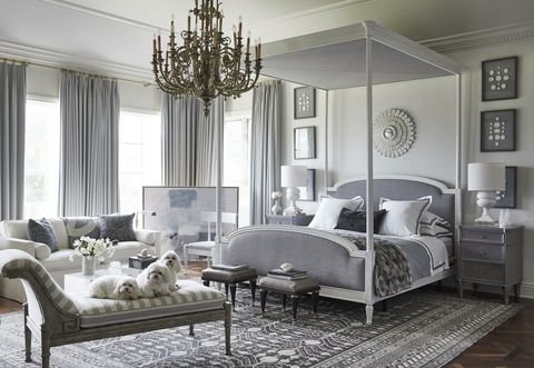 pebble beach château designed by mary mcdonald the skinners’ bedroom with lounge striped chaise ferguson copeland the canopy bed was designed by mcdonald for chaddock rug, mansour
