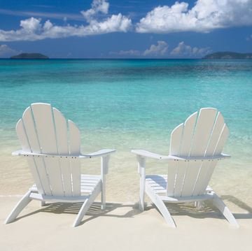 white chairs on the Caribbean beach
