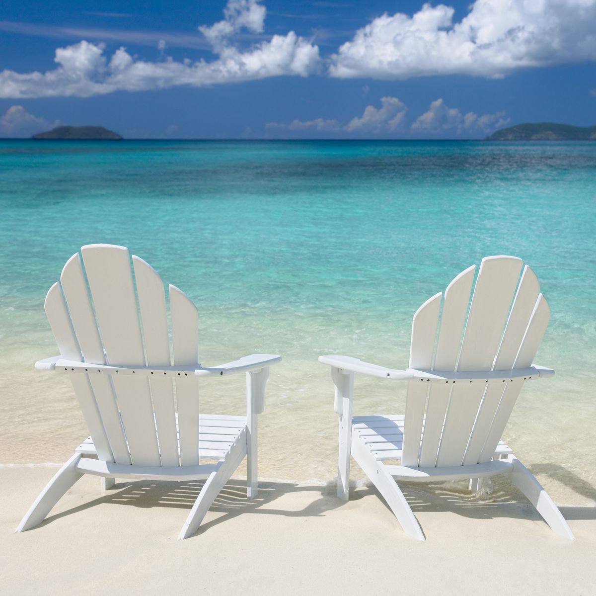 white chairs on the Caribbean beach