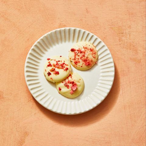 white chocolate meltaways with crushed freeze dried strawberries on top