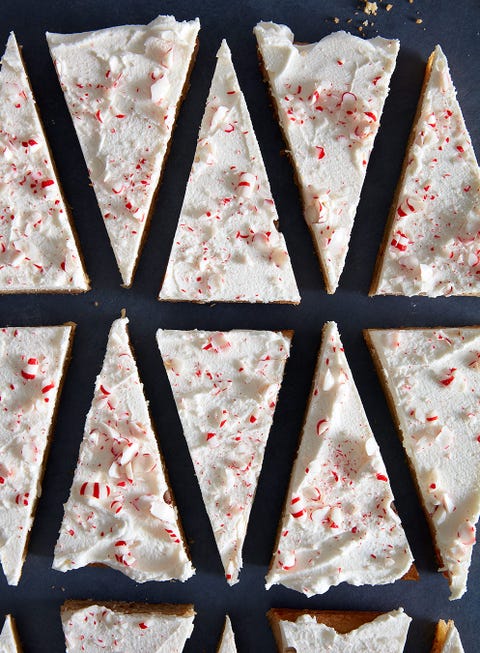 White Chocolate Peppermint Blondies peppermint blondies cut into triangles and covered in white chocolate topped with crushed peppermint candy
