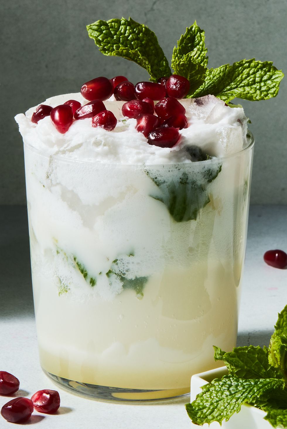mojito with fresh mint and pomegranate seeds