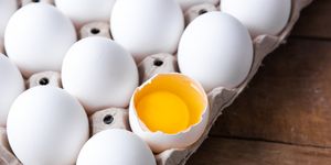 white eggs in carton basket