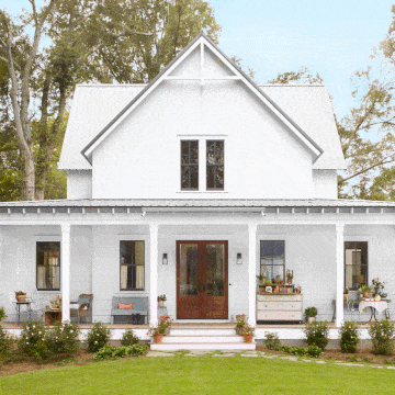 white farmhouse with porch