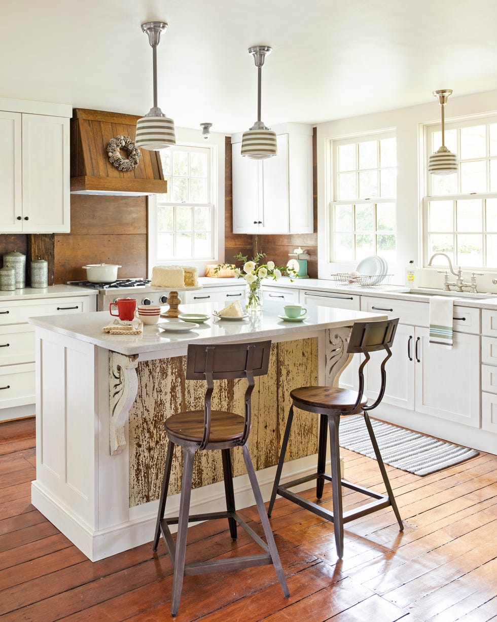 white farmhouse kitchen with striped pendant lights