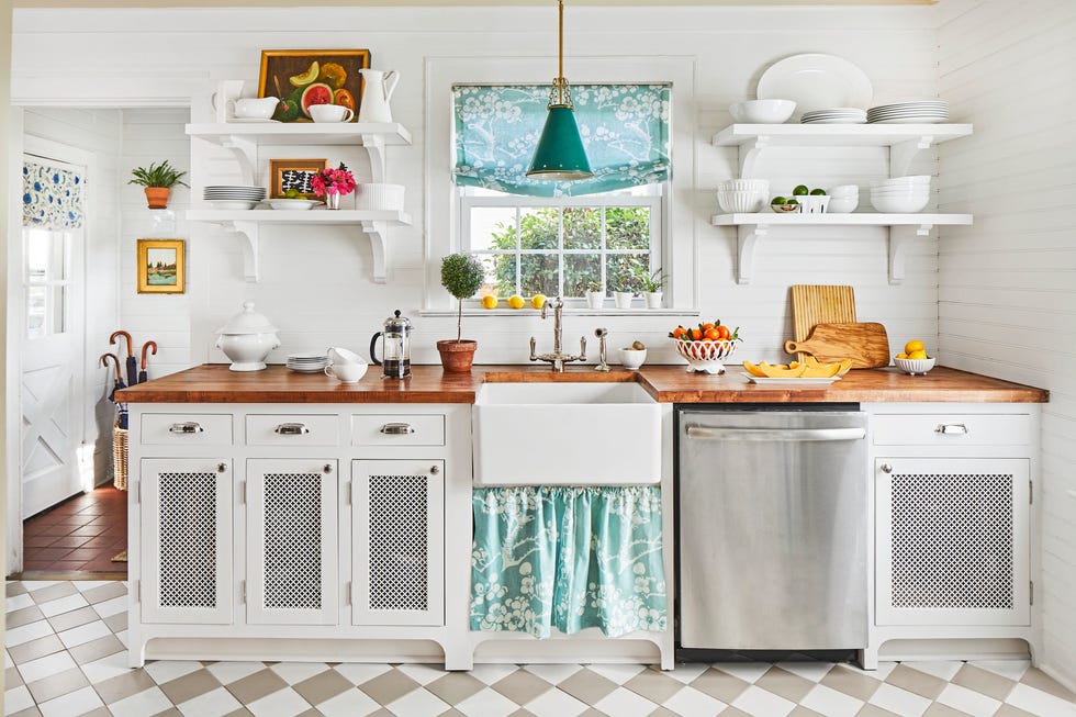 white galley kitchen with skirted sink and open shelving