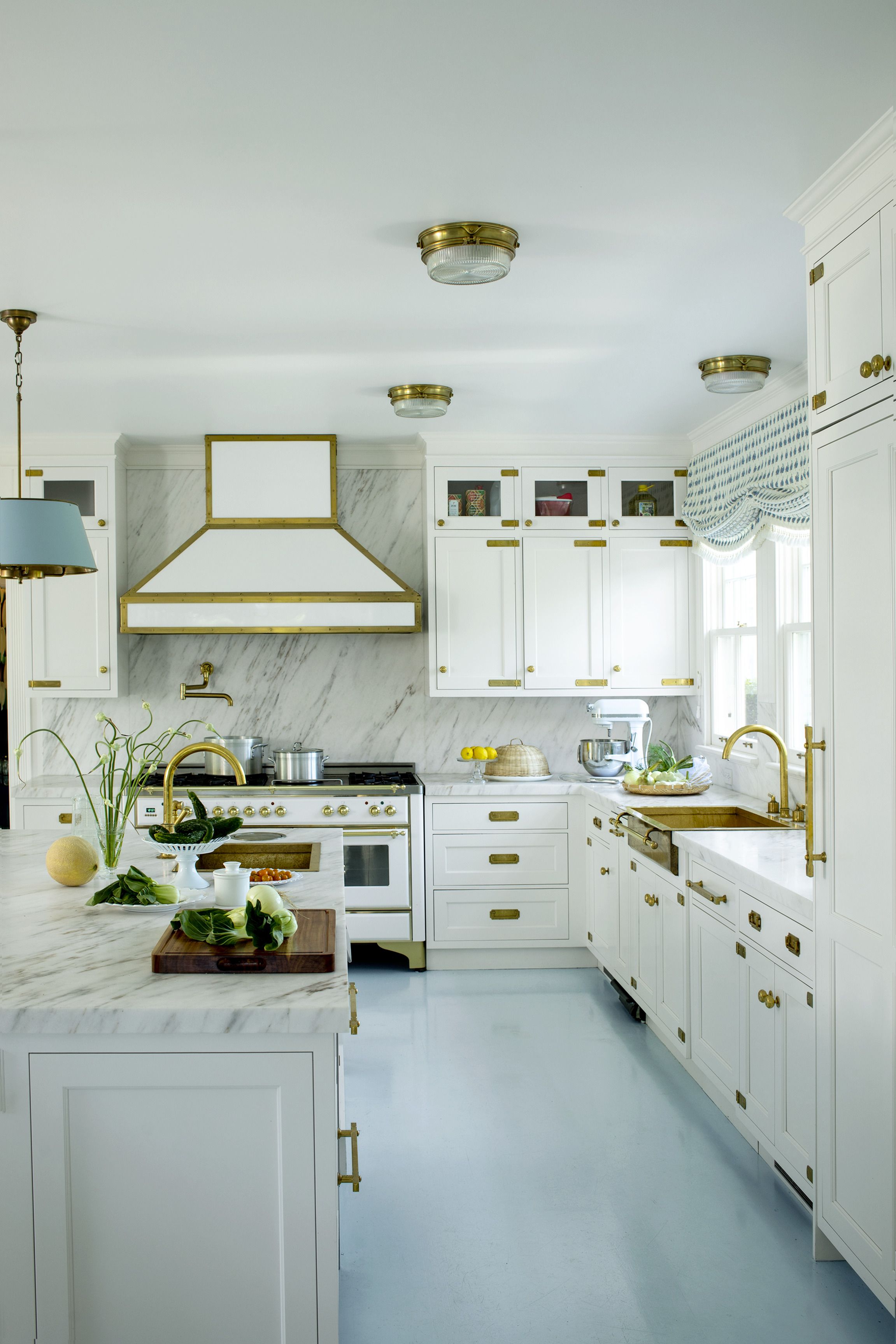 antique white kitchen cabinets with black island