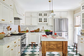 white kitchen with green and white checkerboard floor