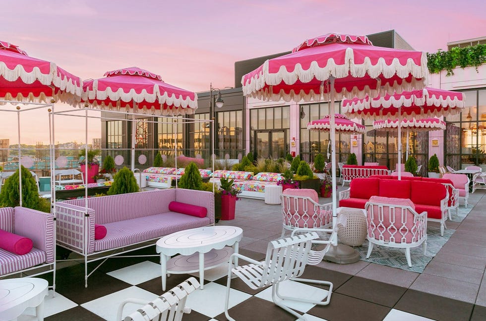 outdoor bar with pink scalloped umbrellas