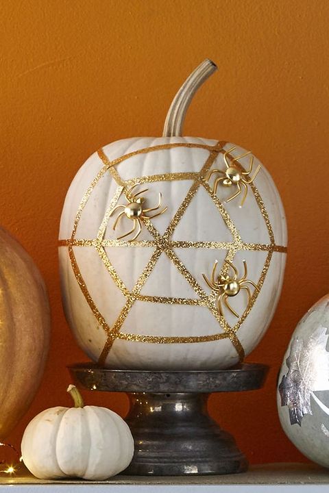 gold spider painted pumpkin