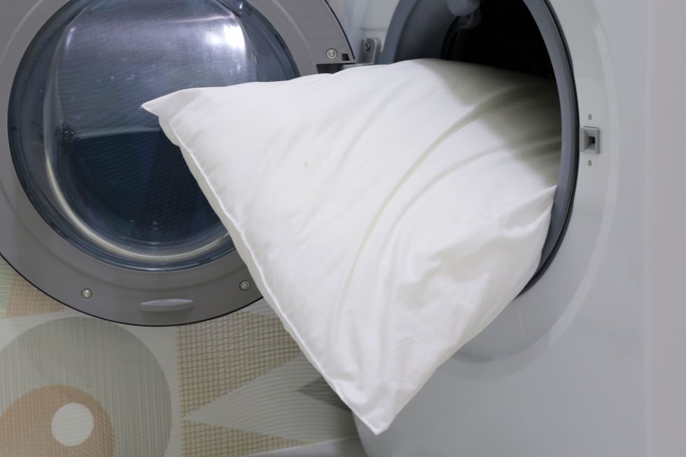 white pillow in washing machine