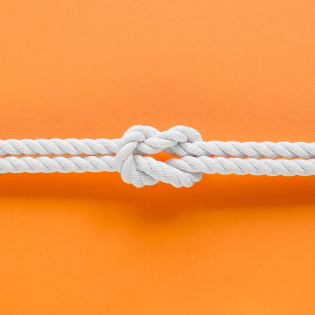 white ship ropes connected by reef knot