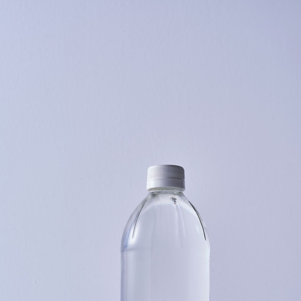 white vinegar against white background