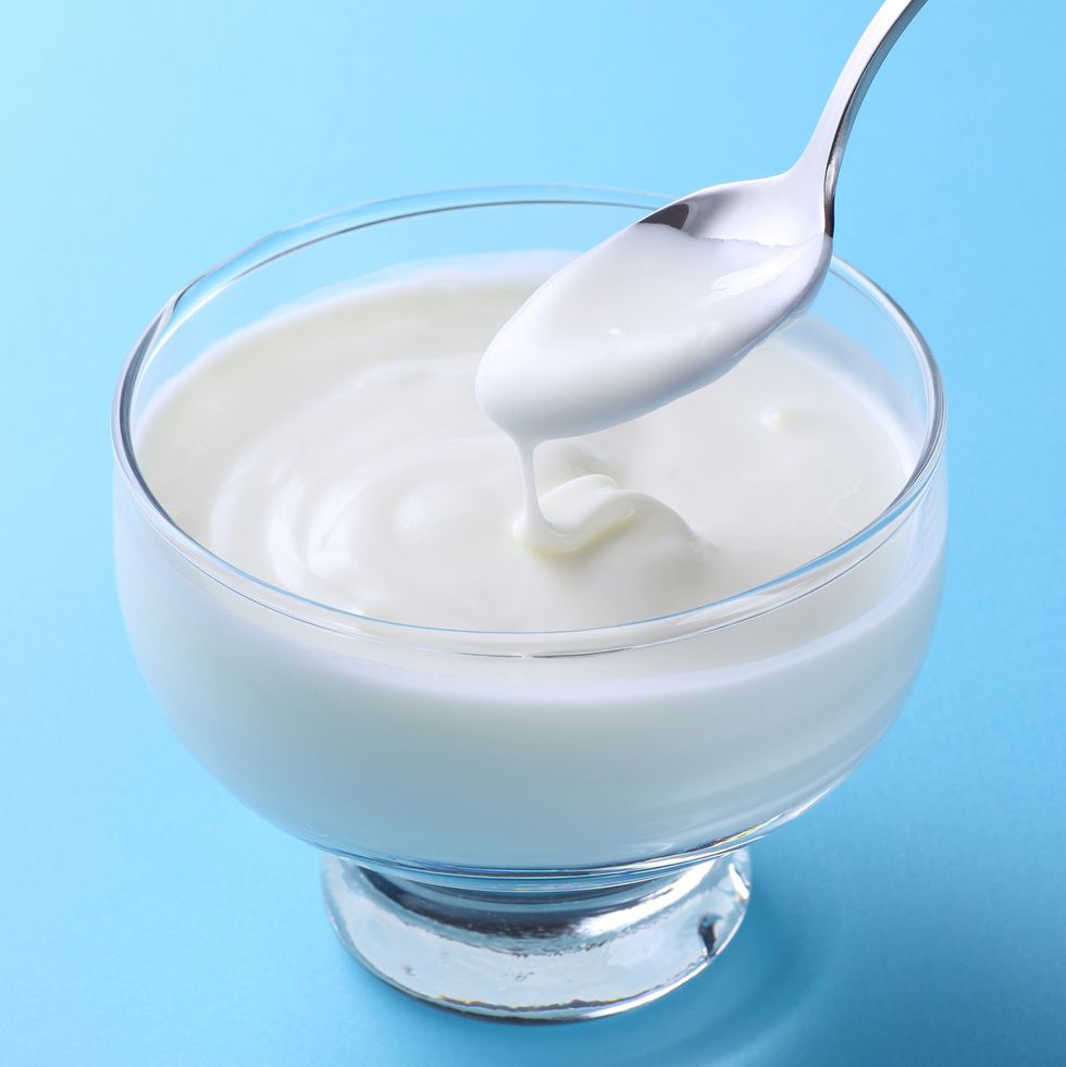 White Yogurt on blue background