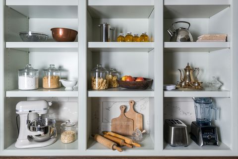 open shelves filled with kitchen supplies