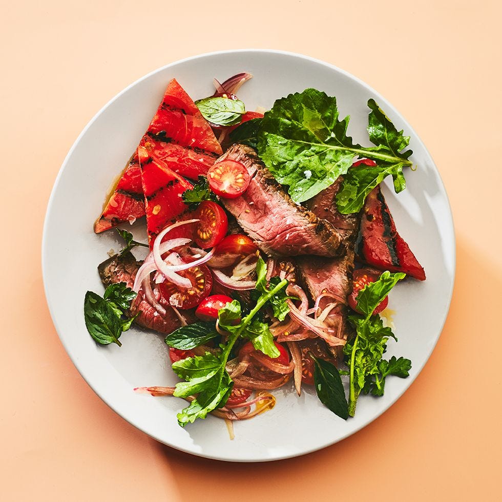 steak salad with grilled watermelon on a plate