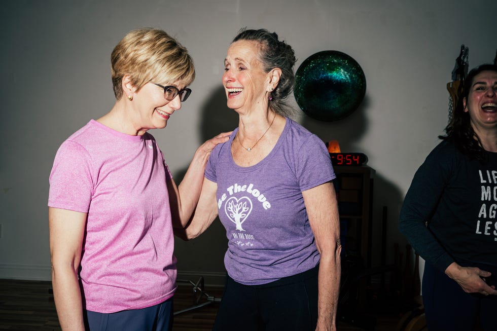ann nassoura (left) and peggo horstmann hodes share a mid workout smile.