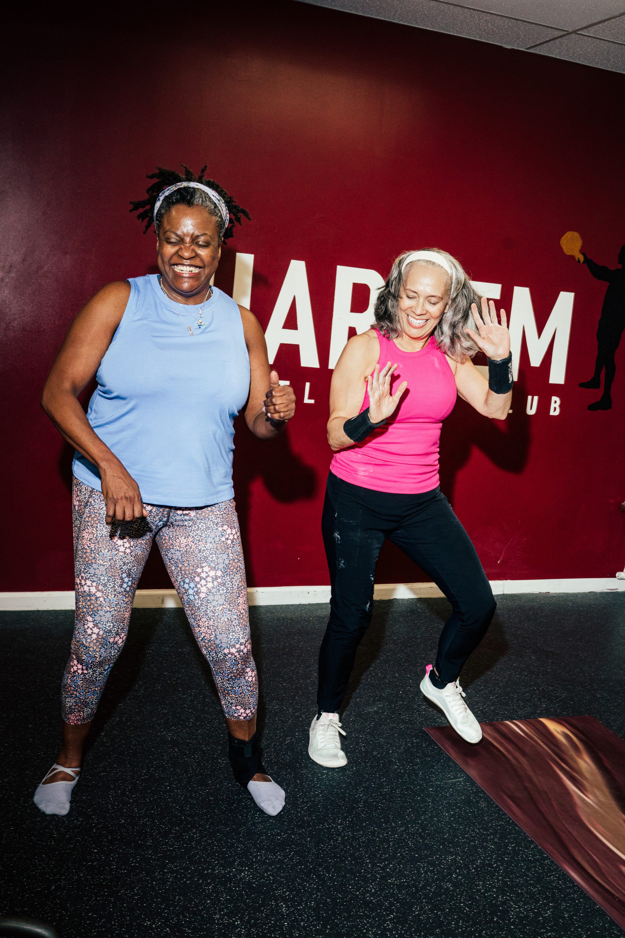 heather green and heather jackson share lifts, but also laughs, during sweaty sessions at harlem kettlebell club in new york city.