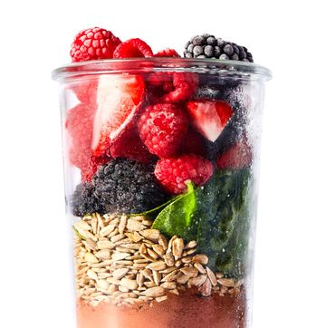 chocolate berry protein smoothie ingredients in a jar