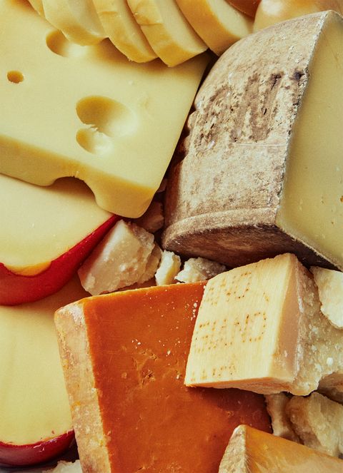 a pile of cheeses