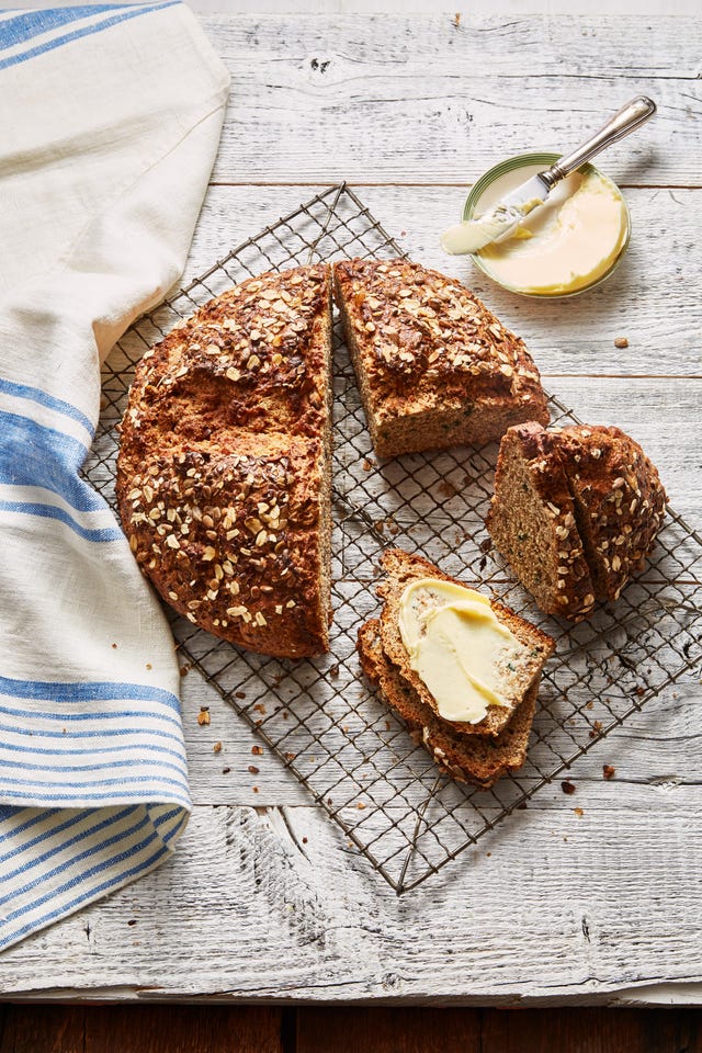 irish soda bread sliced with butter on top