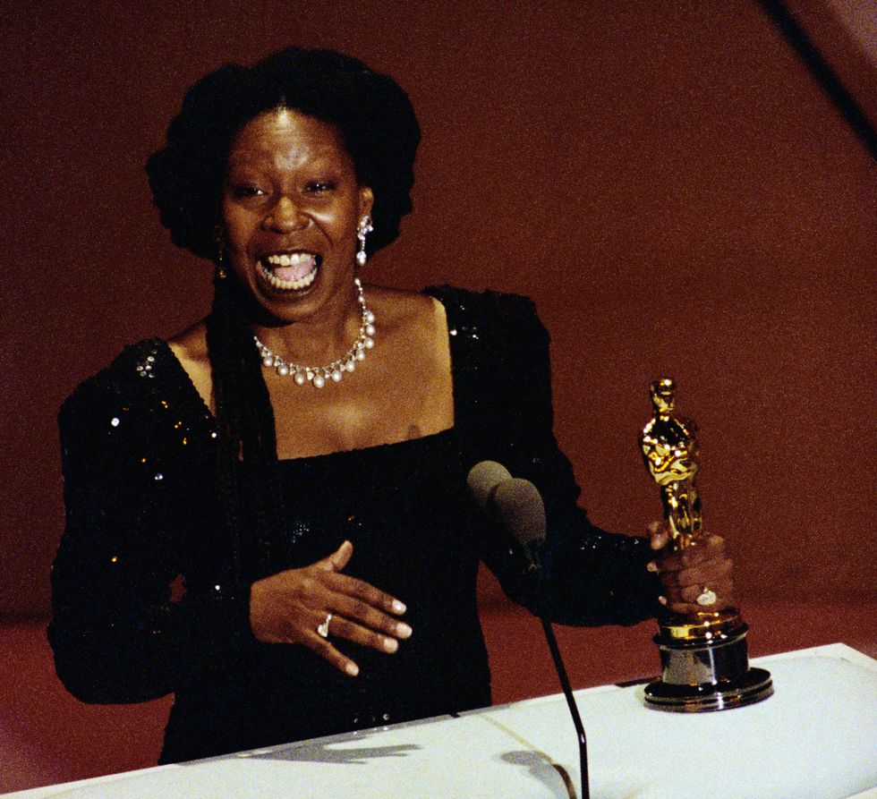 Whoopi Goldberg holds her Best Supporting Actress Oscar for her role in Ghost March 25