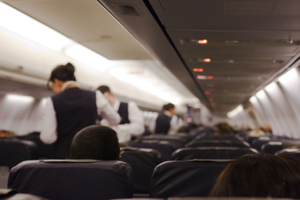 Flight attendants don't ask to see your boarding pass to direct you to your seat
