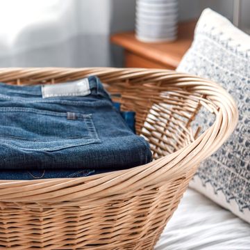 jeans in wicker laundry basket
