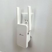 wifi extender plugged into wall