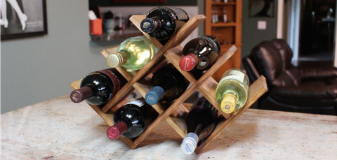 Bottle, Wine bottle, Wine rack, Furniture, Glass bottle, Drinkware, Home accessories, Tableware, Drink, Shelf, 