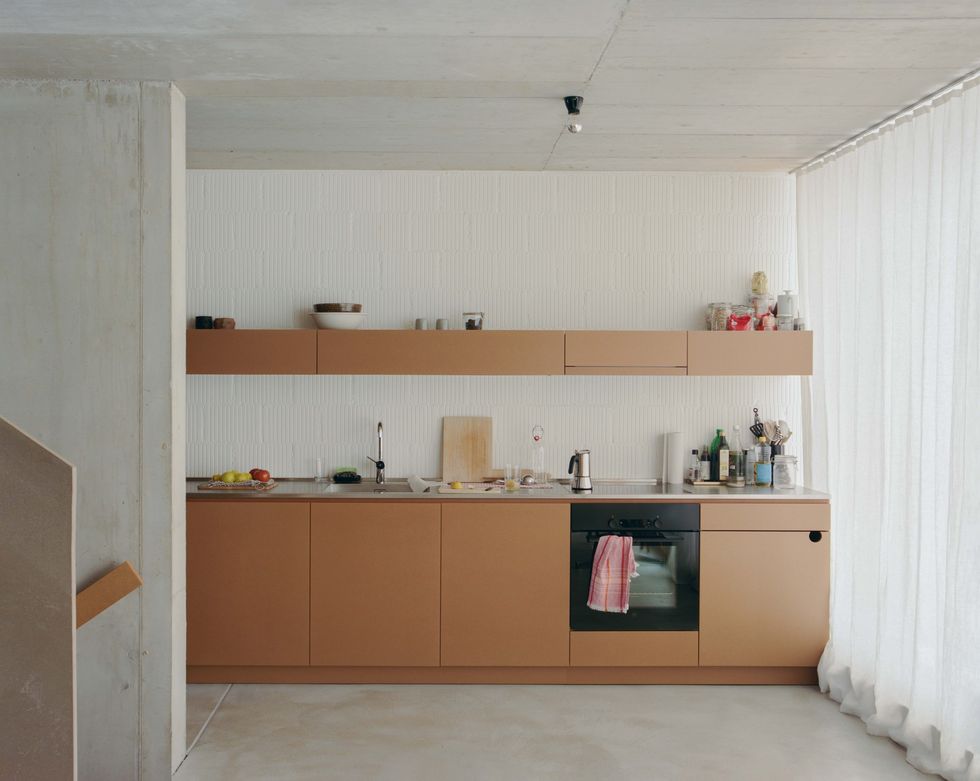 a kitchen with shelves and cabinets