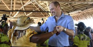britains prince william r dances with a garifuna women at hopkins village, belize on march 20, 2022 photo by johan ordonez afp photo by johan ordonezafp via getty images