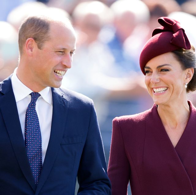prince william and kate middleton laughing at an event