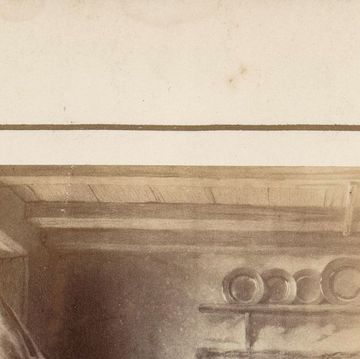 drawing of a woman and a man sitting inside near a window, she looks down, he looks at her