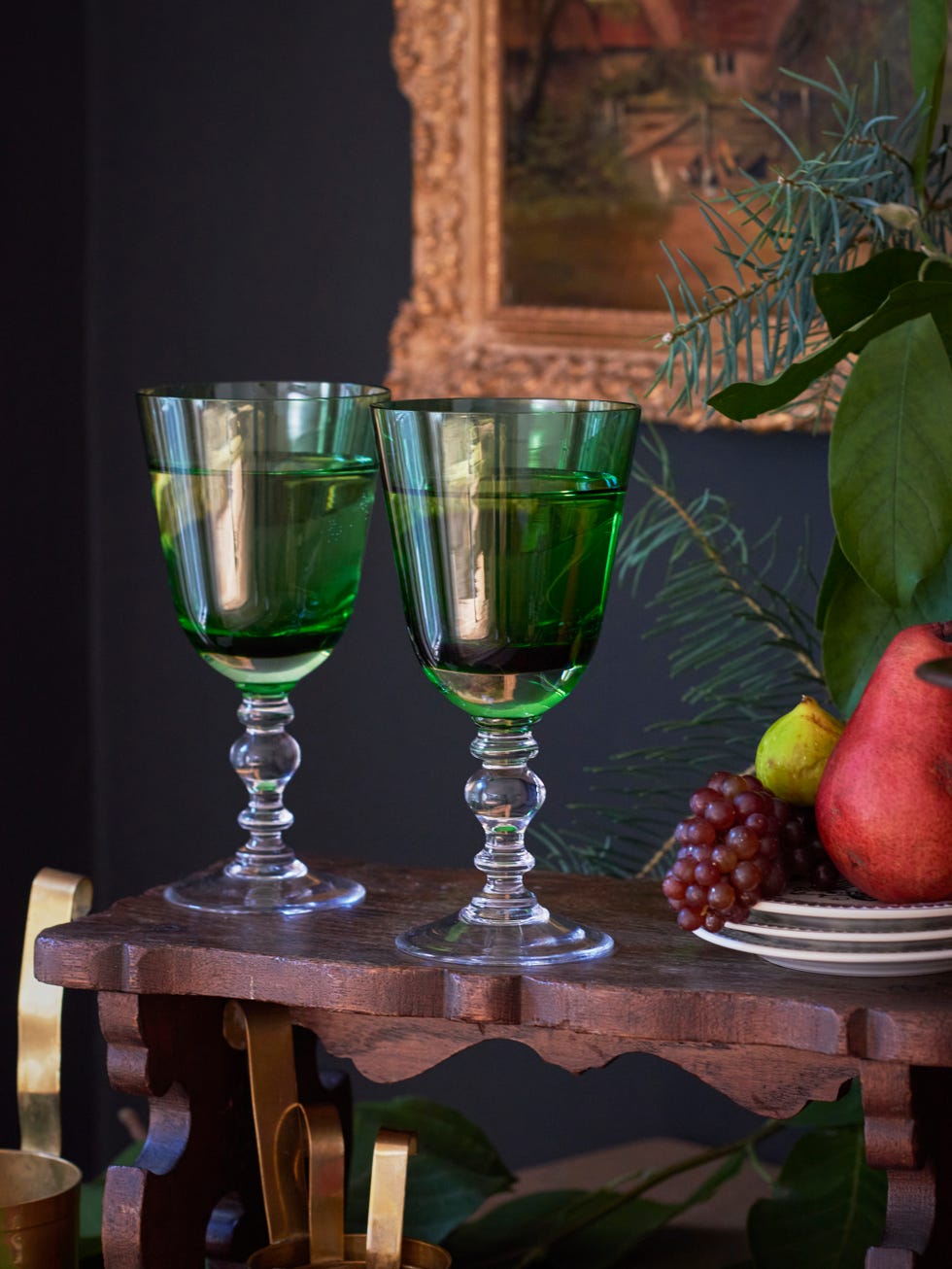 a couple of glasses of wine on a table