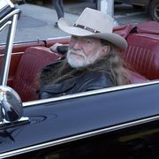 willie nelson on the set of his video for the song "mariashut up and kiss me"