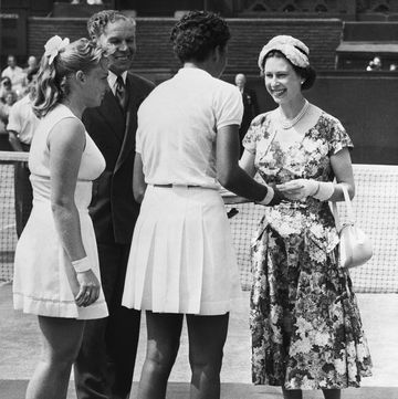 queen elizabeth gives wimbledon trophy to althea gibson