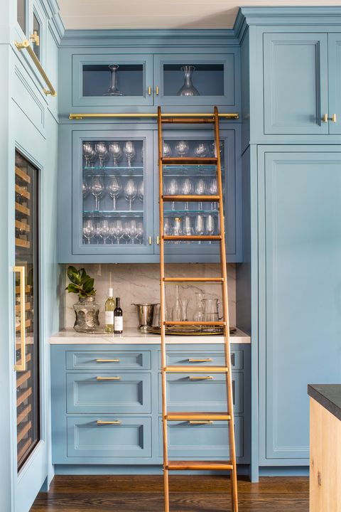 blue painted cabinets in home bar