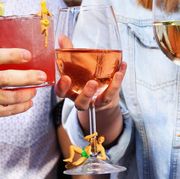 drinking buddies wine charms on rose and white wine glasses