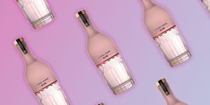 Product, Skin, Pink, Beauty, Hand, Material property, Bottle, Liqueur, Drink, Nail, 
