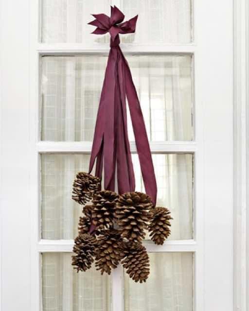 winter crafts pinecone door hanger