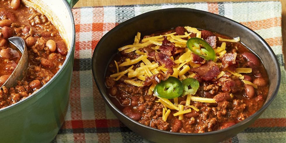 beef and bean chili with shredded cheese and jalapenos