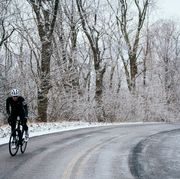 chris pino riding in the winter on a road, time spent outside in snow boosts body appreciation