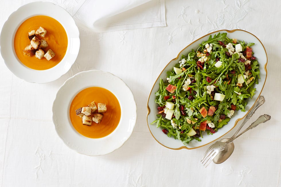 butternut squash soup in a white bowl