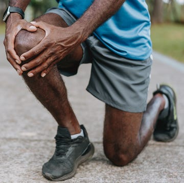 With hands on knee pain with hands on knee pain