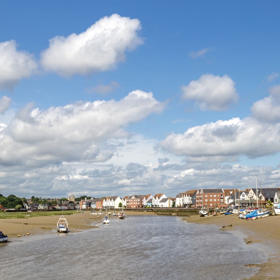 scenic maritime mood at wivenhoe's waterfront on river colne, south east of colchester, essex, england, united kingdom the town's history centers on fishing, ship building, and smuggling